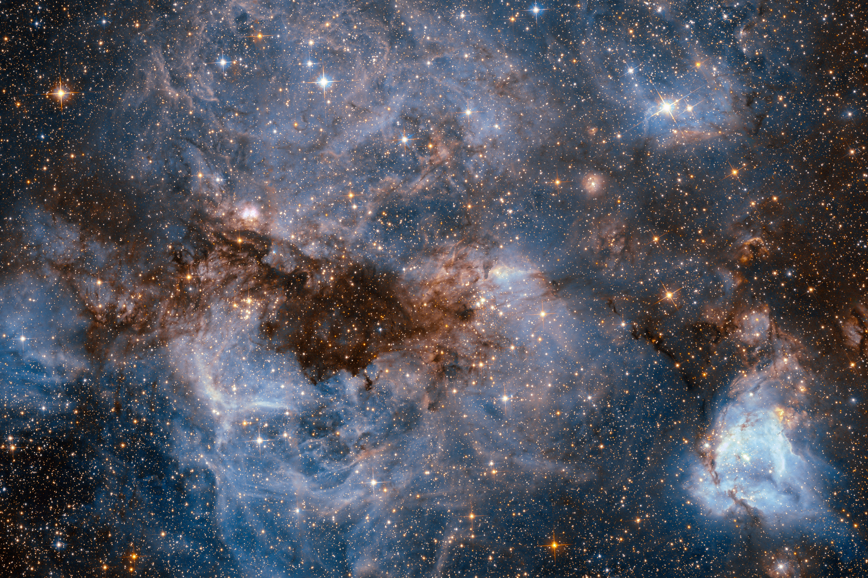 Ионизированный водород и облака пыли объекта N159 в Большом Магеллановом Облаке. Фото опубликовано на сайте НАСА. (3000x2000)